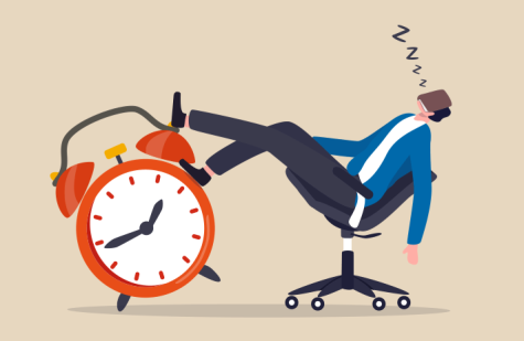 Person sleeping with feet on a clock